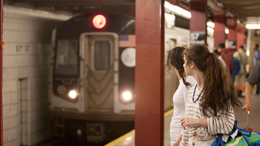 Two young women on subway platform